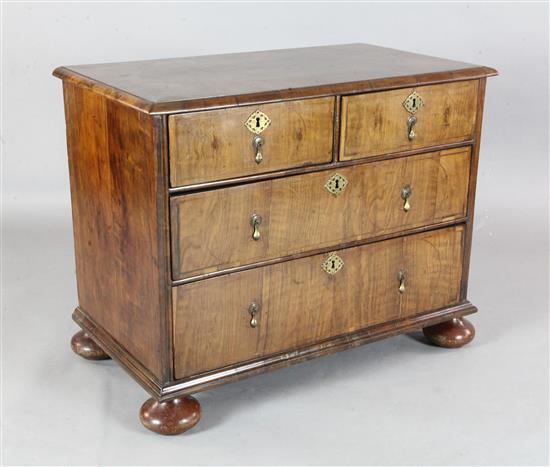 A George II walnut chest, W.3ft 2in. D.1ft 9in. H.2ft 6in.